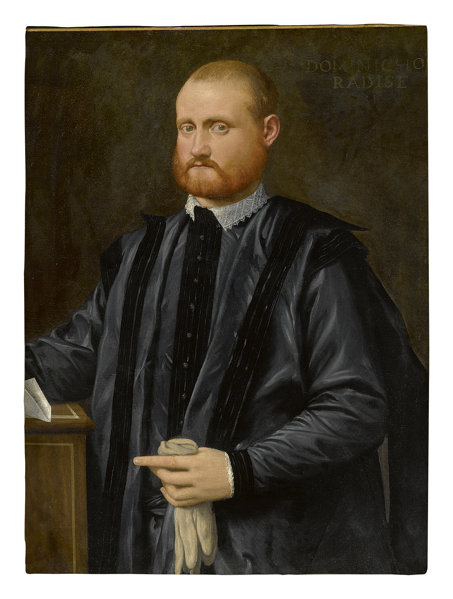 ATTRIBUTED TO GIOVANNI DE' BUSI, CALLED CARIANI | PORTRAIT OF A GENTLEMAN, THREE-QUARTER LENGTH, HOLDING A PAIR OF GLOVES WITH HIS LEFT HAND