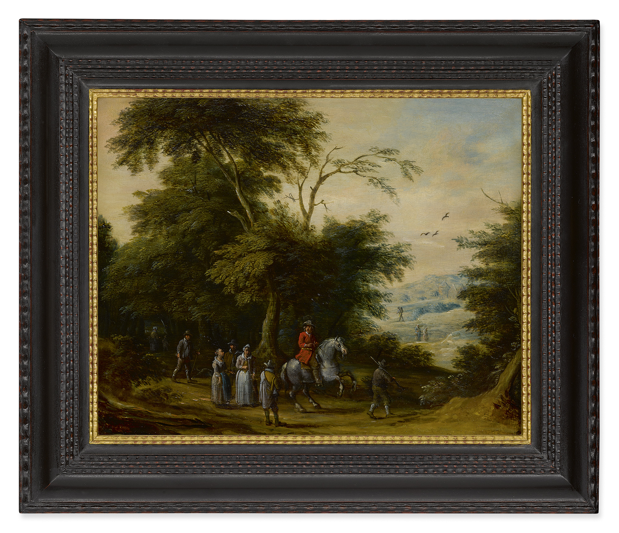ATTRIBUTED TO ADRIAEN VAN STALBEMT | A WOODED LANDSCAPE WITH A CAVALRYMAN AND OTHER FIGURES IN THE FOREGROUND